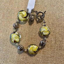 Load image into Gallery viewer, Gold glass swirls
